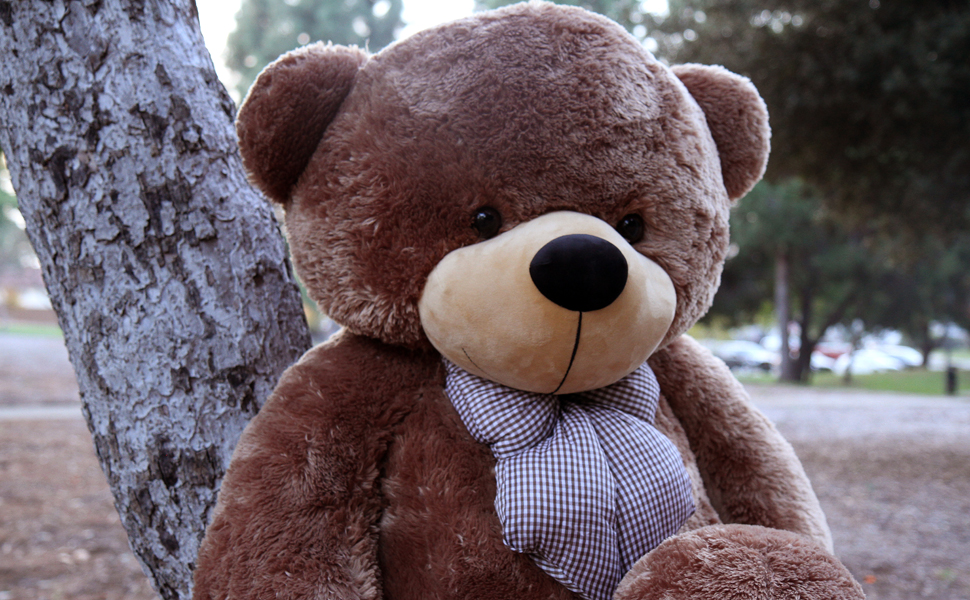 brown-giant-teddy-bear-sitting-on-a-tree.jpg brown-giant-teddy-bear-sitting-on-a-tree.jpg