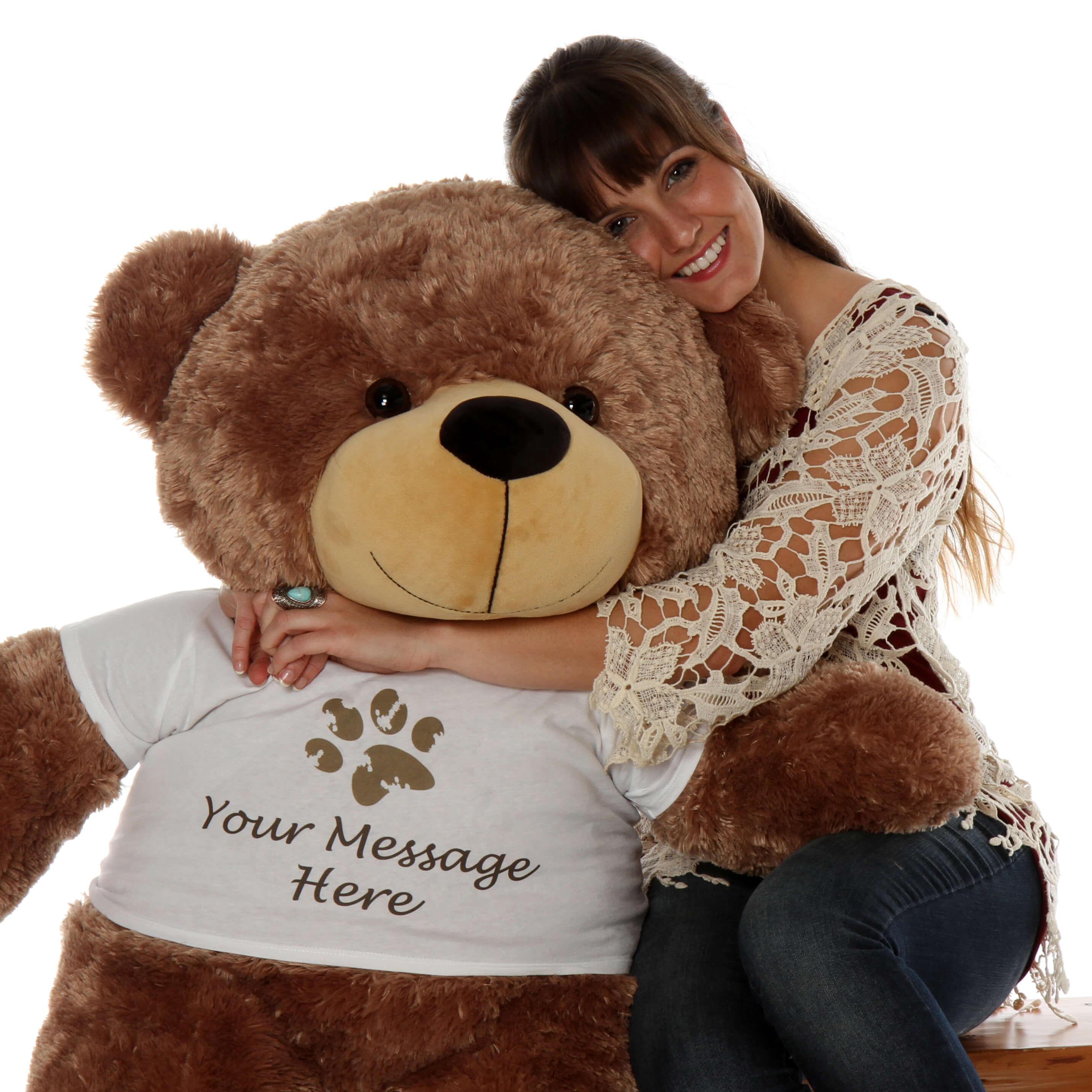 sunny-cuddles-is-a-personalized-teddy-bear-with-a-paw-stamp-t-shirt-that-you-can-customize.-this-cute-mocha-brown-teddy-bear-1.jpg Young women with brown teddy bear